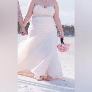 Strapless corset blush-colored David’s Bridal wedding gown